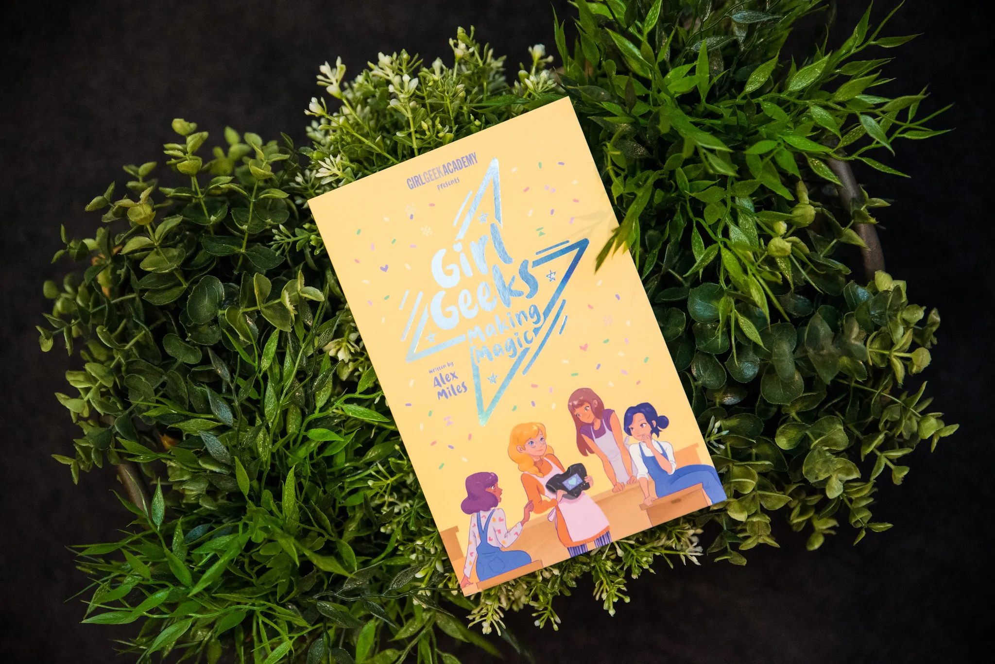 Another Girl Geeks book on a bed of leaves