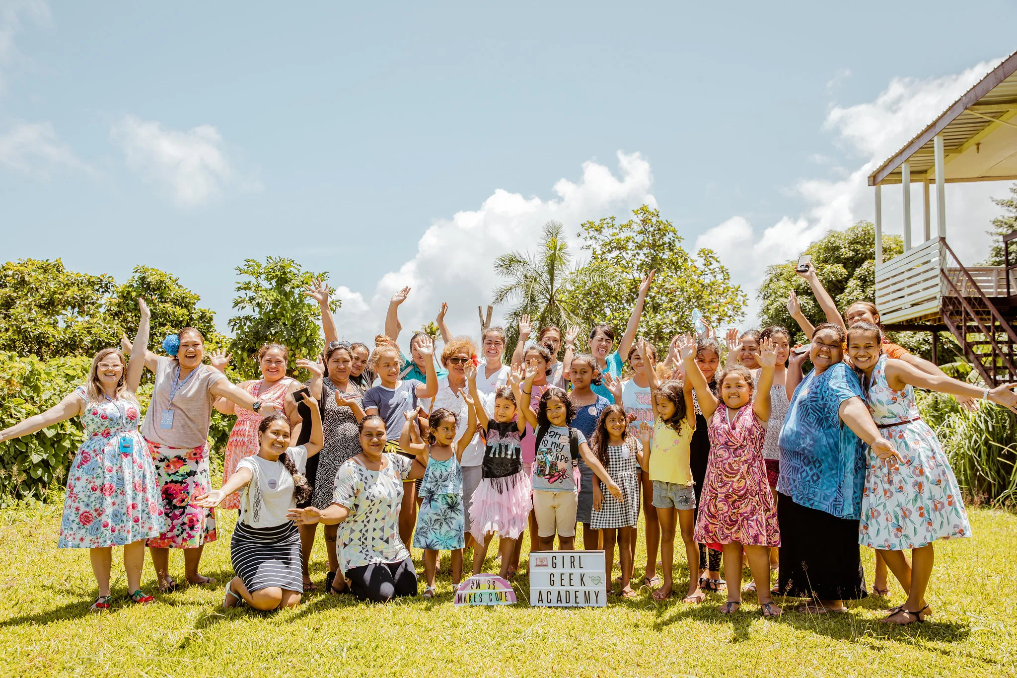Participants cheering on the lawn