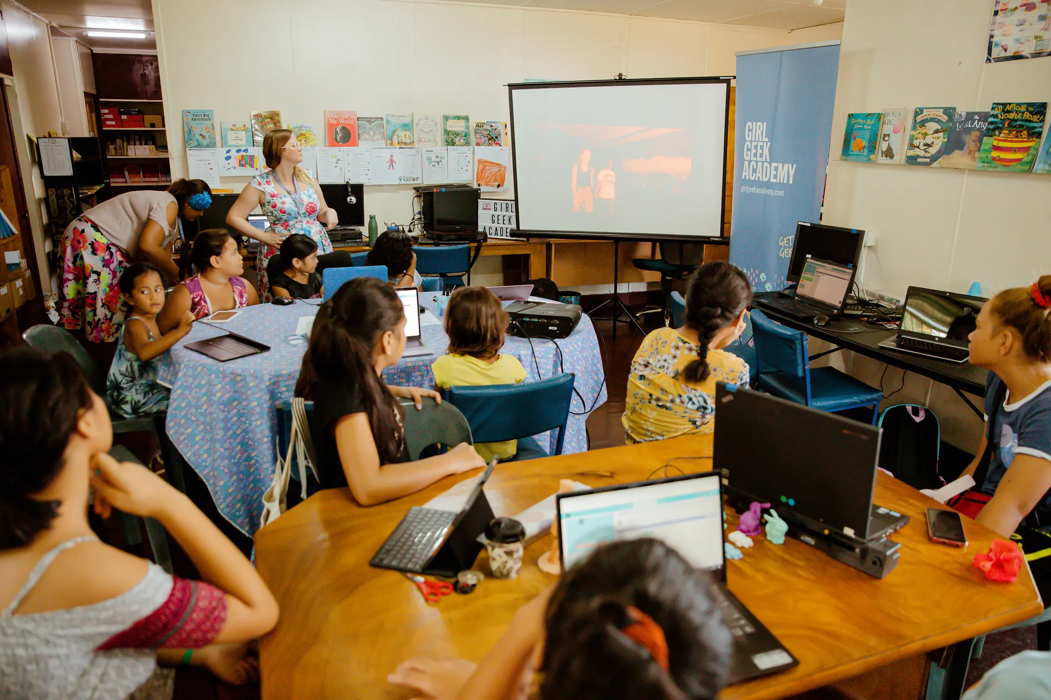 A classroom of girls at computers