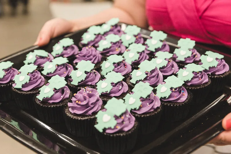 A tray of purple and mint cupcakes at #SheHacks 2016