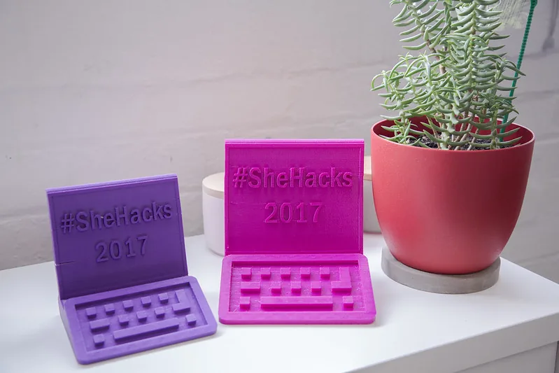 3D-printed #SheHacks 2017 trophies shaped like laptops
